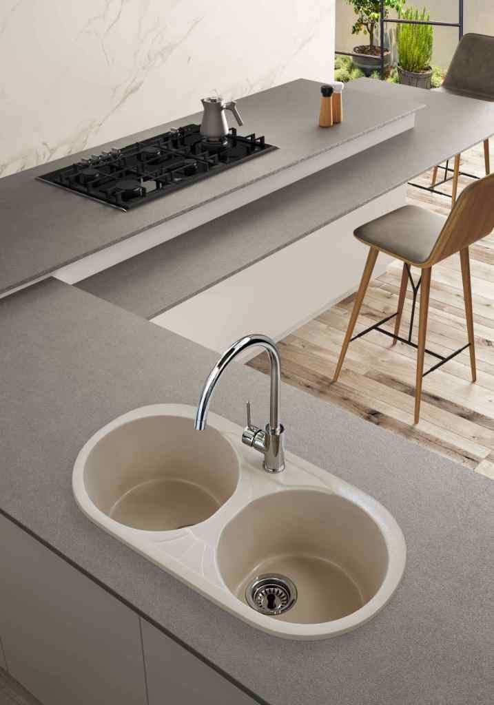 Fregadero Dafne de dos senos circulares instalado sobre encimera; grifería, encimera, mueble y decoración no incluidos.