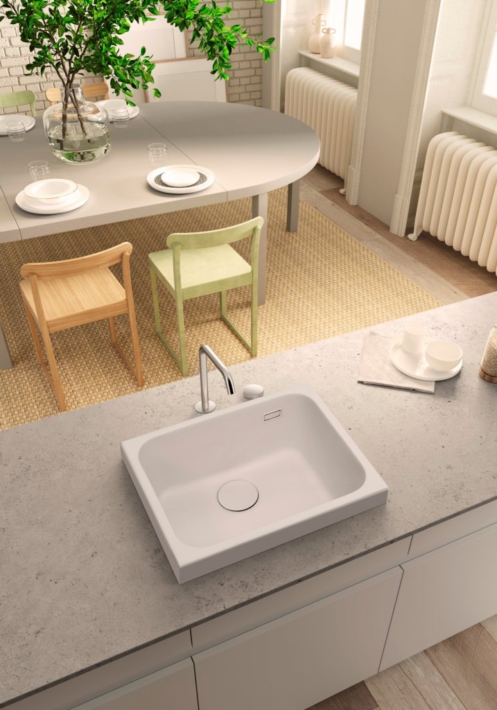 Fregadero Dion de un seno rectangular instalado sobre encimera; grifería, encimera y accesorios decorativos no incluidos.