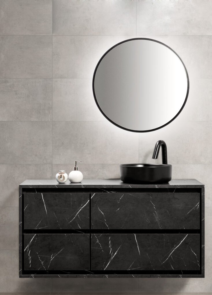 Conjunto Haití de 120 cm en Negro efecto mármol, con cuatro cajones, tapa y un lavabo circular negro.
