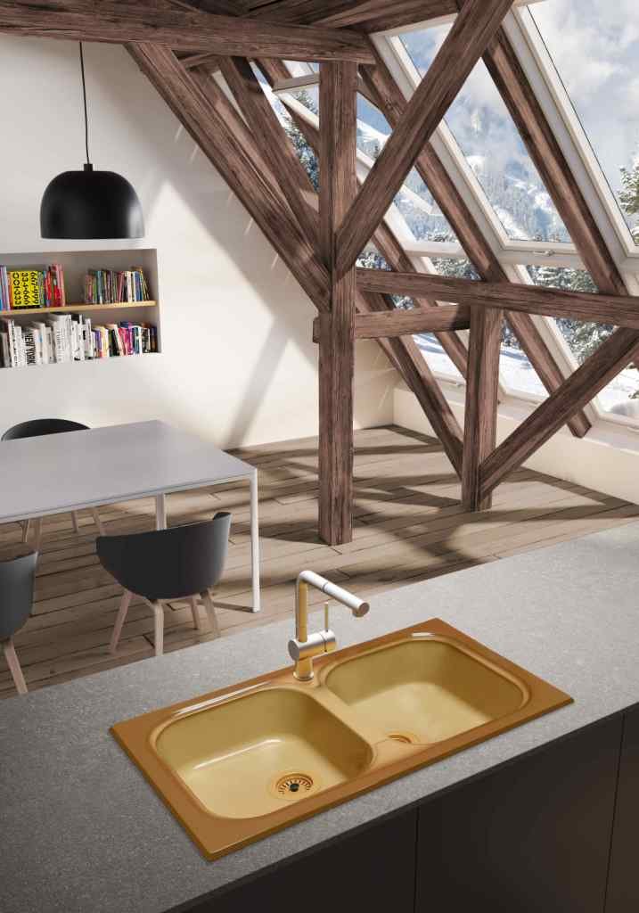 Fregadero Orion de dos senos cuadrados instalado sobre encimera; grifería, encimera, mueble y decoración no incluidos.