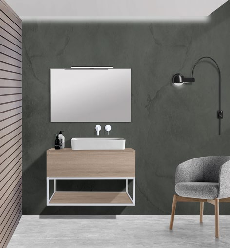 Ambiente MODULARE con mueble roble de un cajón y lavabo rectangular sobre encimera. La estructura blanca, la balda inferior, el espejo y la grifería son elementos del ambiente; cada ficha especifica qué incluye.