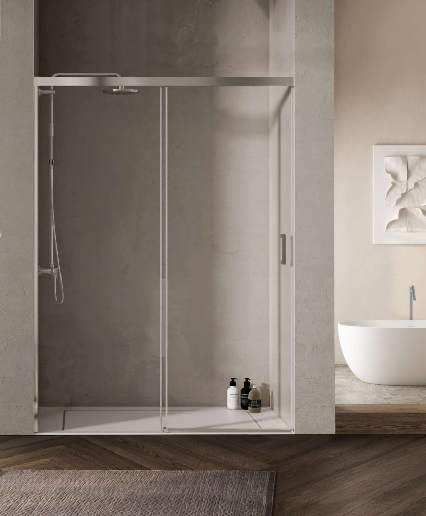 Mampara frontal ST-2 con un fijo y una puerta corredera, perfilería cromo y vidrio transparente