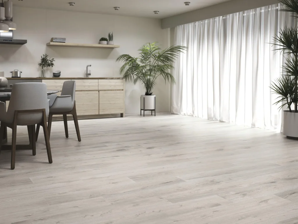 Suelo porcelánico Madeira Sabbia 20 × 120 cm · ambiente de cocina y comedor